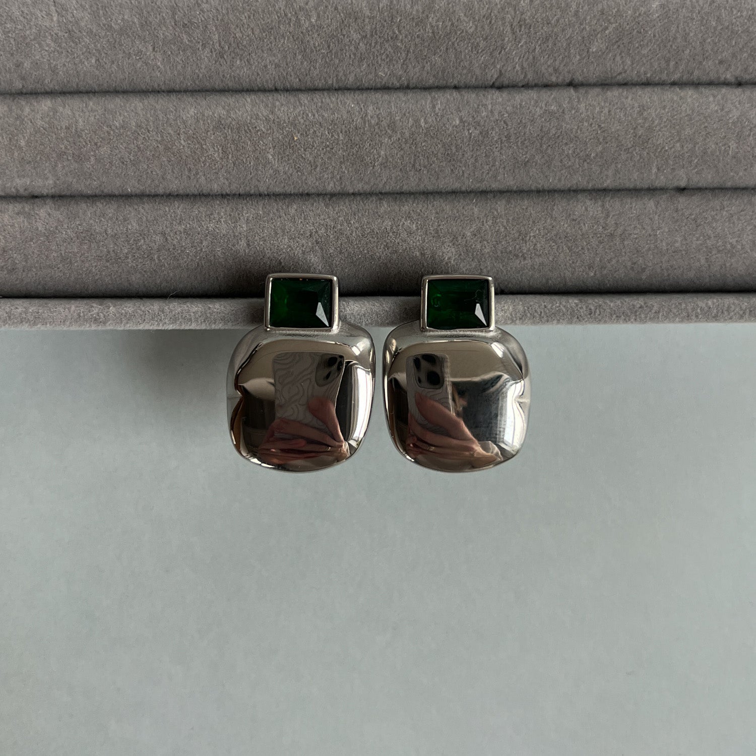 Silver colour statement stud earrings