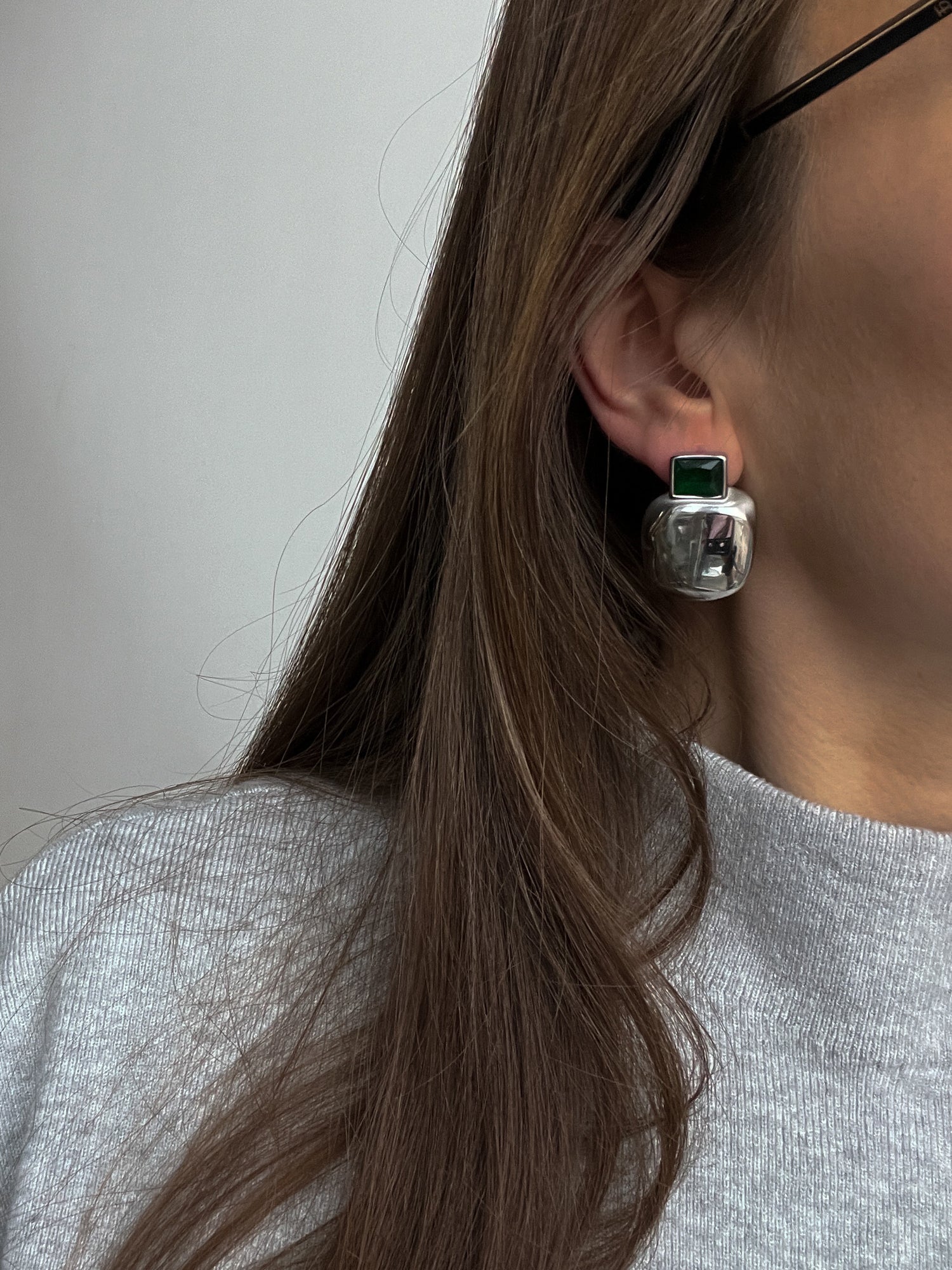 Silver colour statement stud earrings