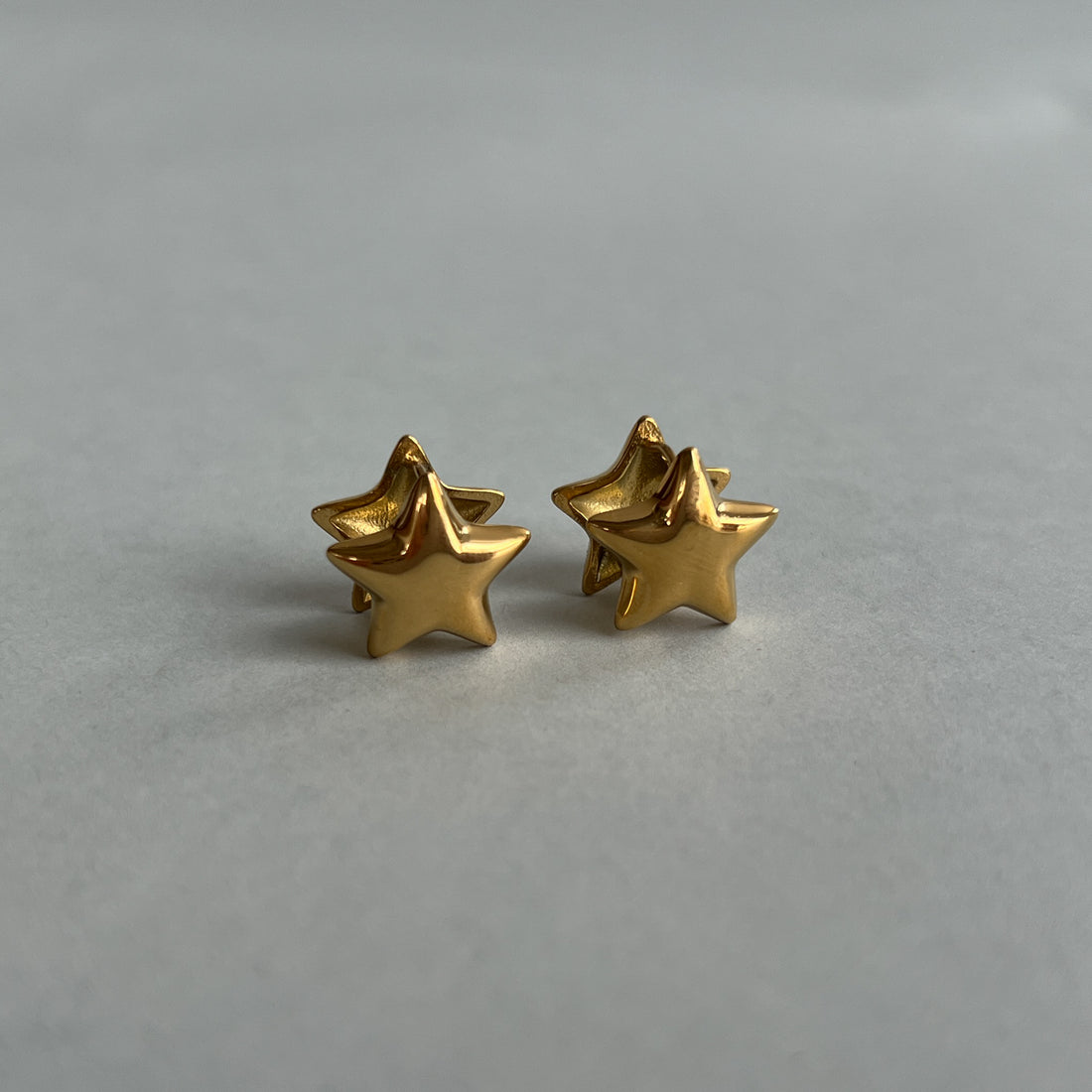 Gold colour star earrings