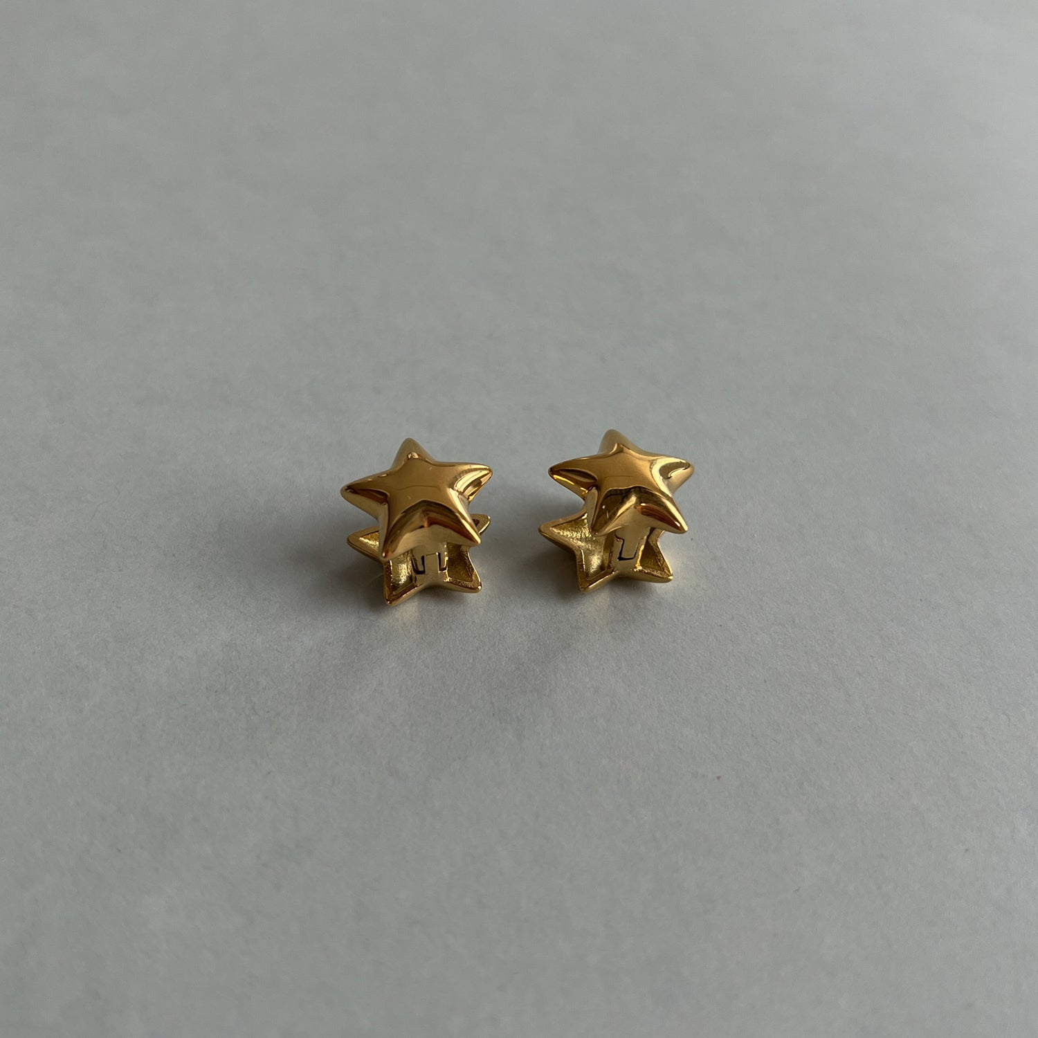 Gold colour star earrings