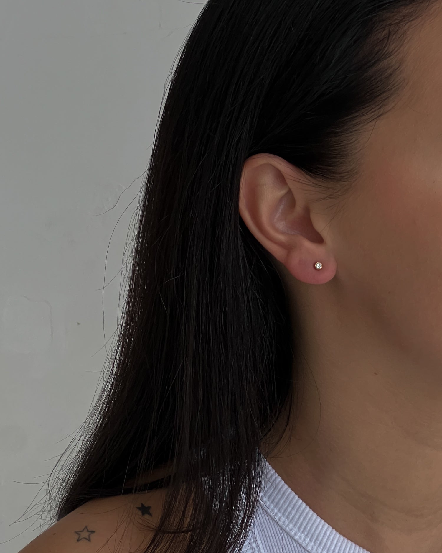 Gold colour small studs with zircons