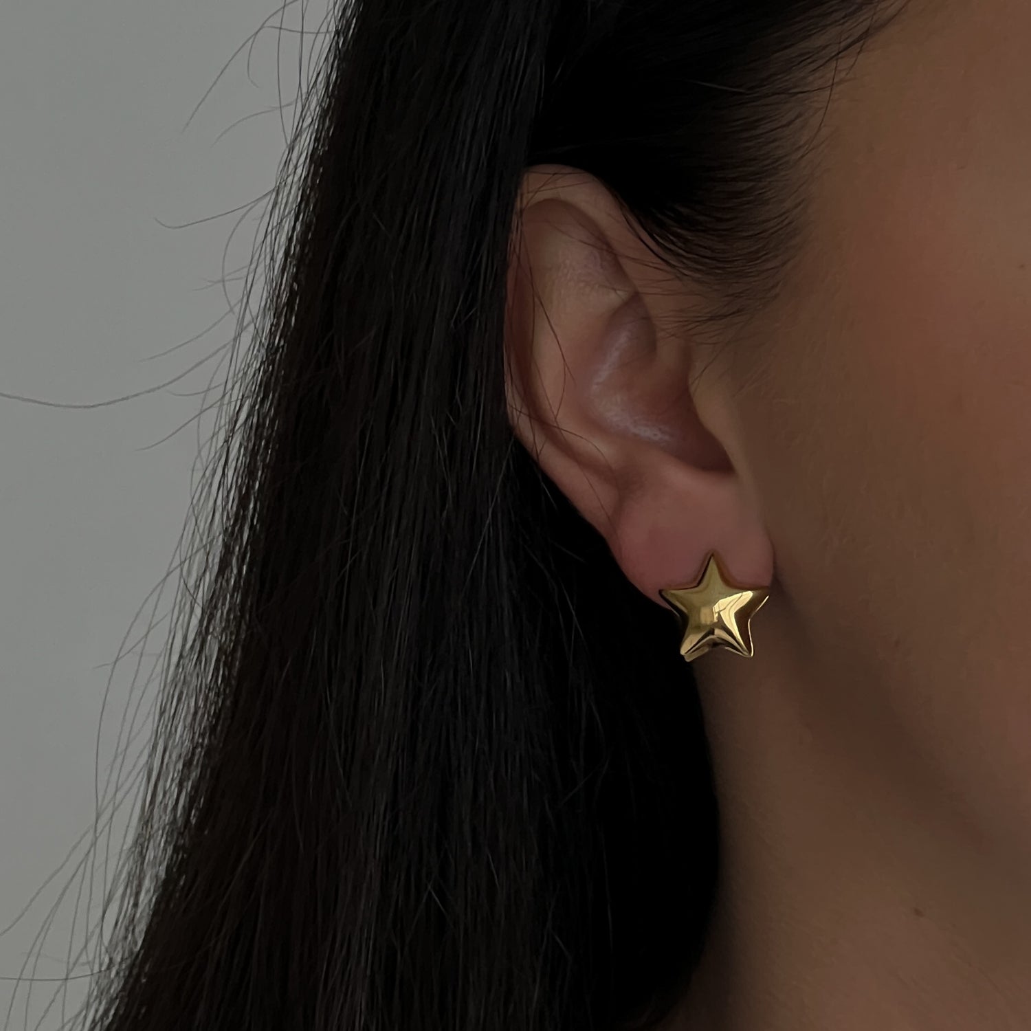 Gold colour star earrings