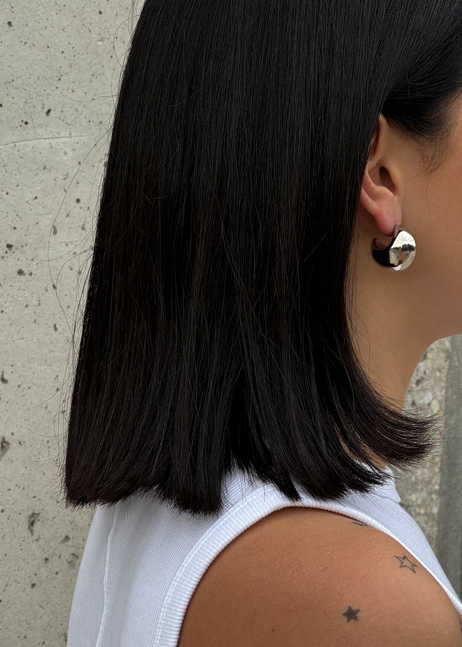 Two sizes silver colour drop shape stud earrings