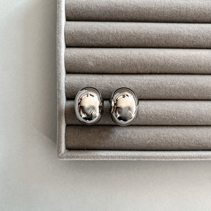 Two sizes silver colour drop shape stud earrings