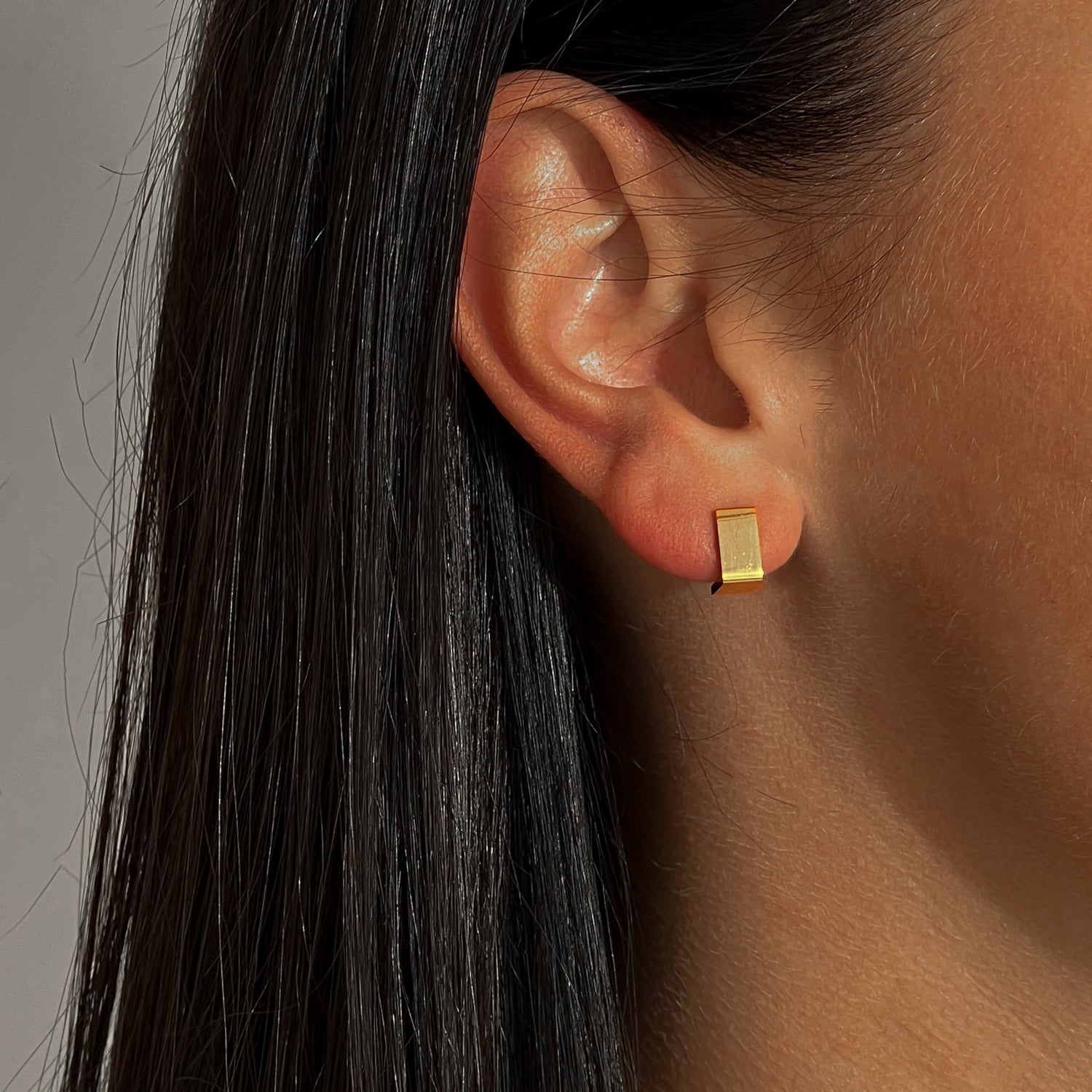 Gold colour modern stud earrings