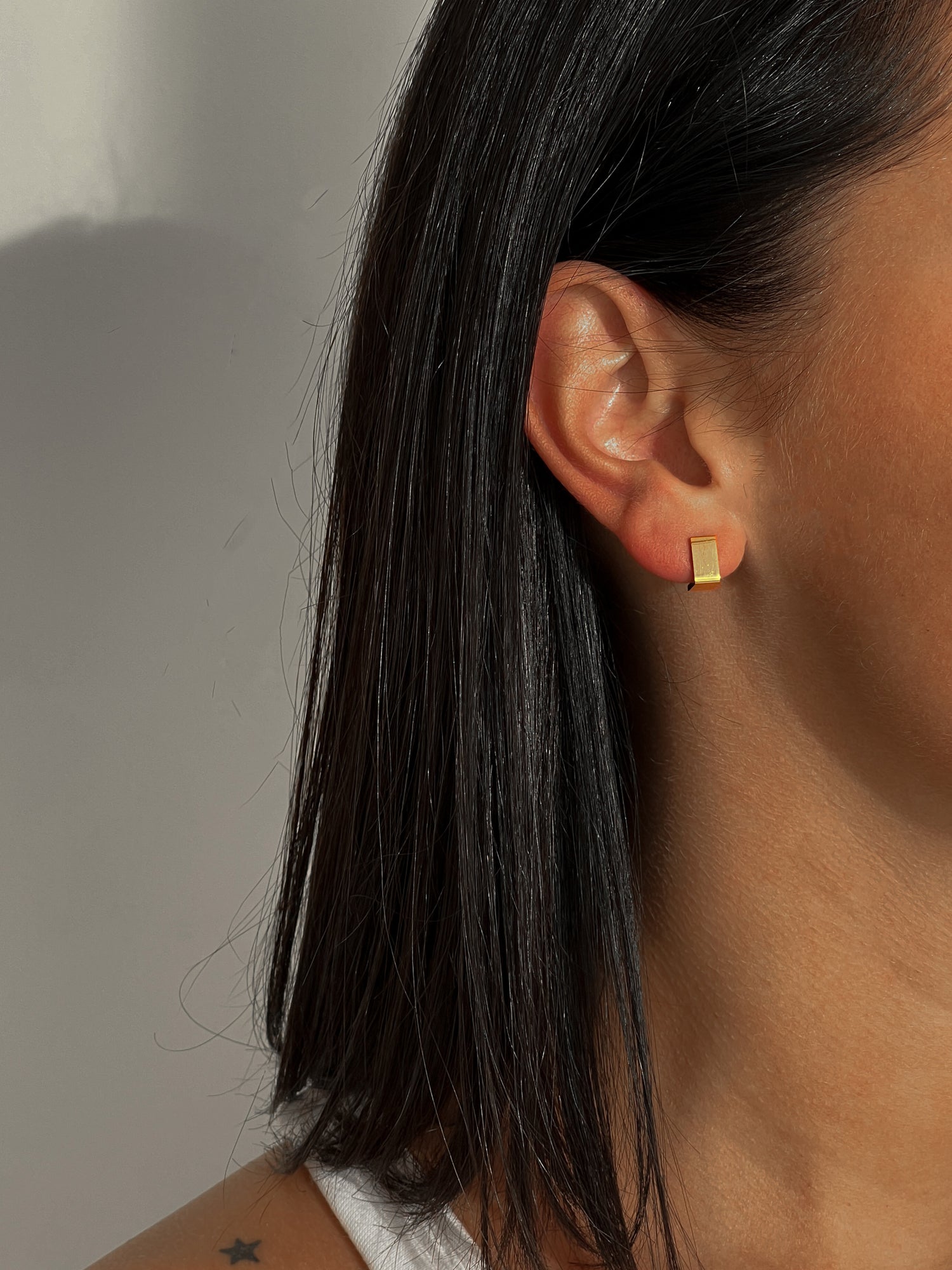 Gold colour modern stud earrings