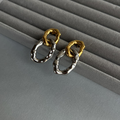 Two-colour statement earrings