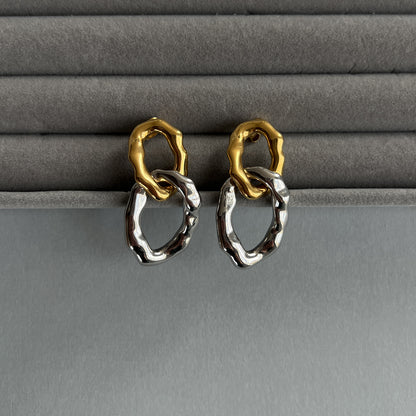 Two-colour statement earrings