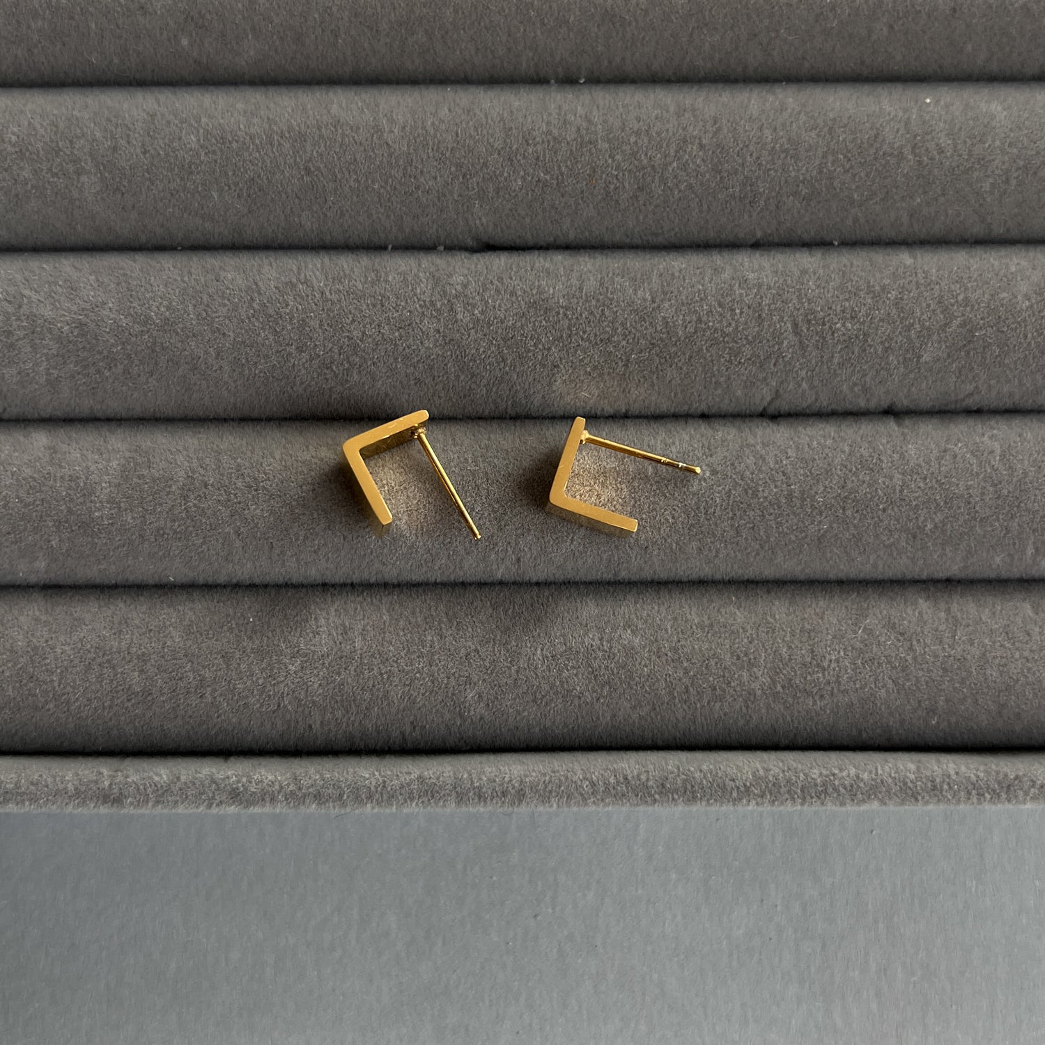 Gold colour modern stud earrings