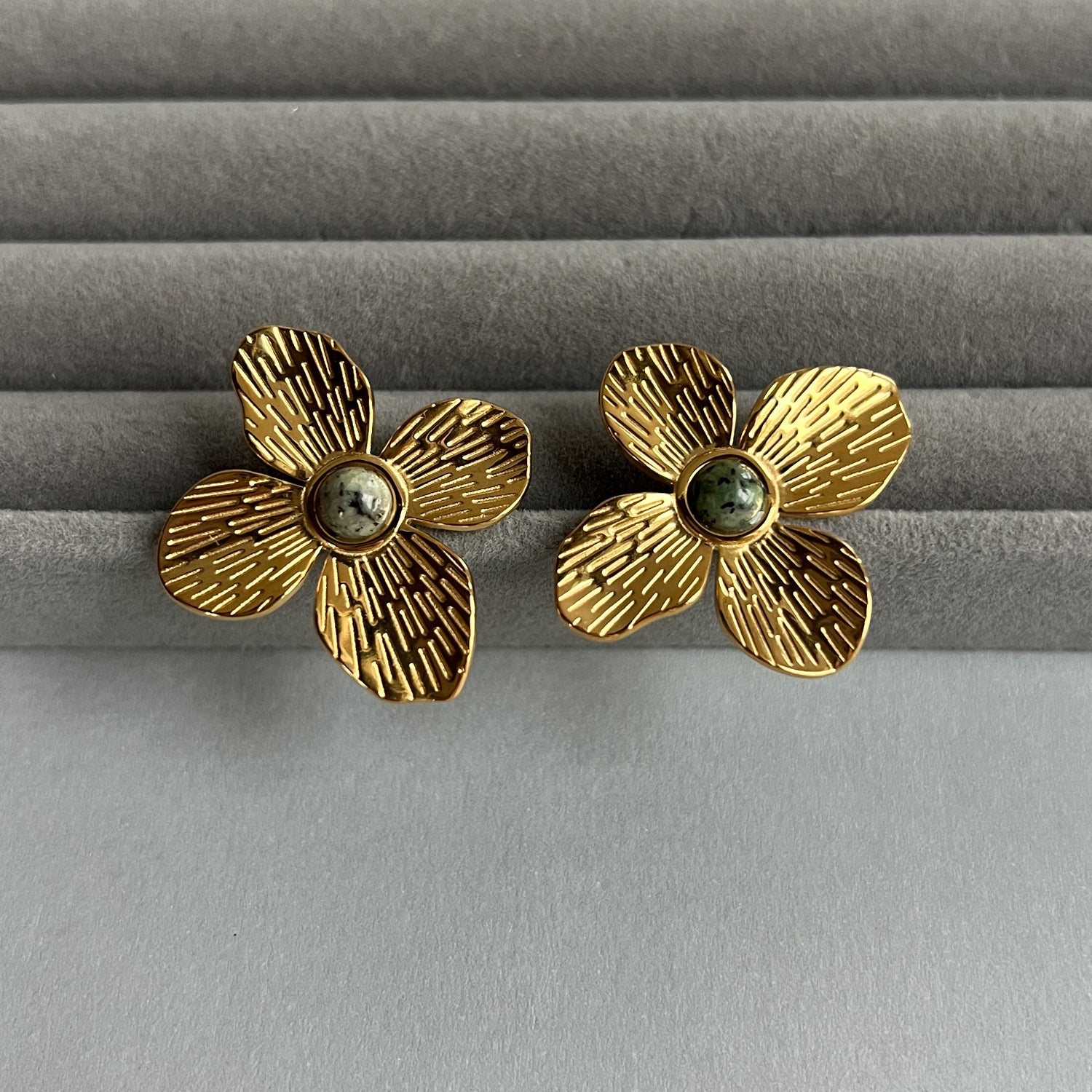 Big flower gold colour stud earrings