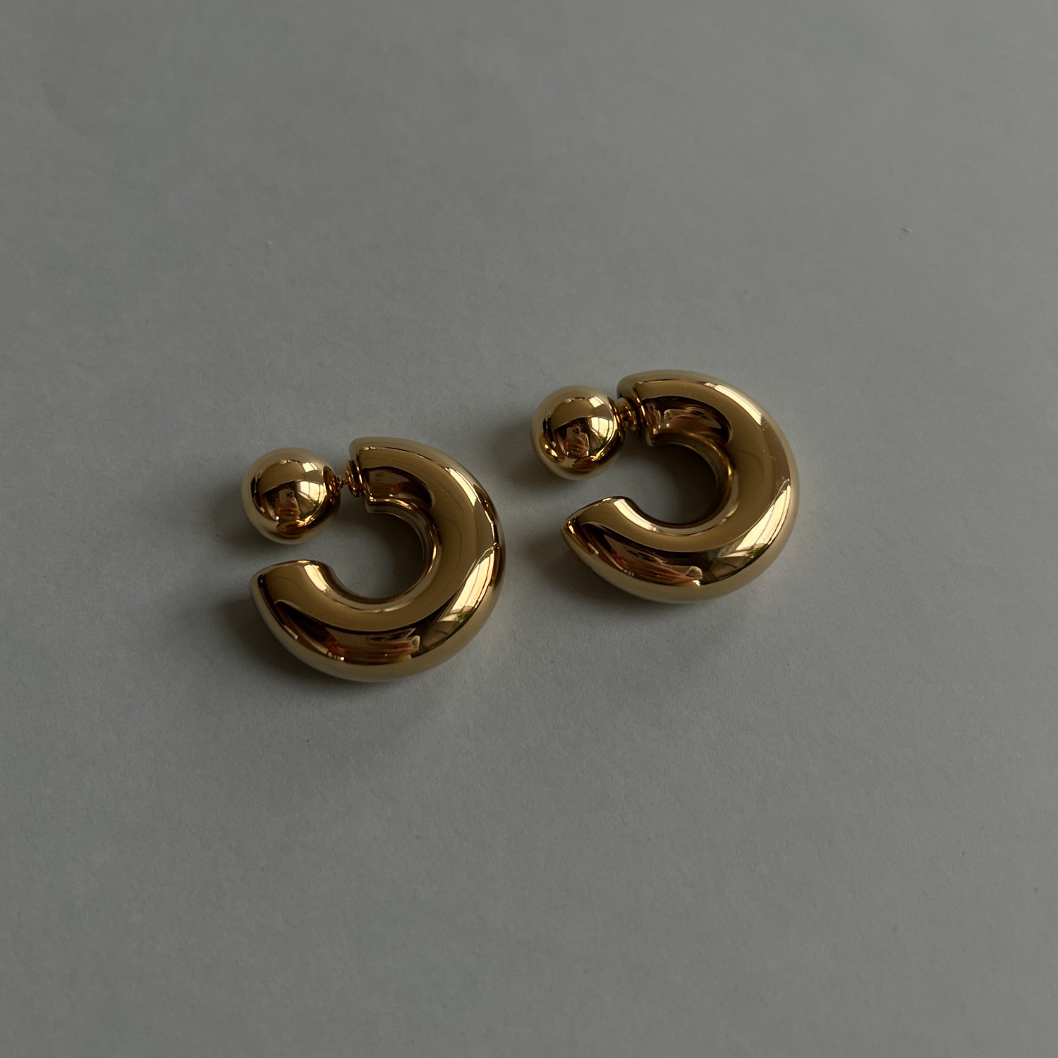 Gold colour oversized double-sided hollow earrings