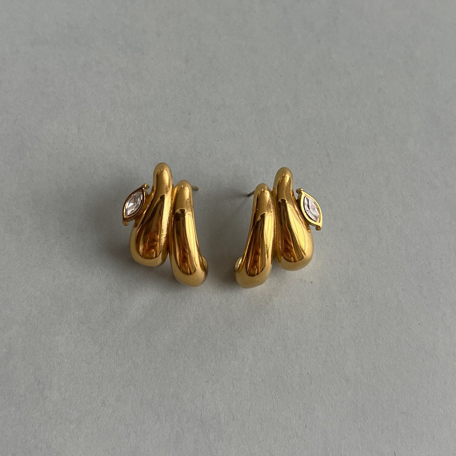 Gold colour studs with zircon