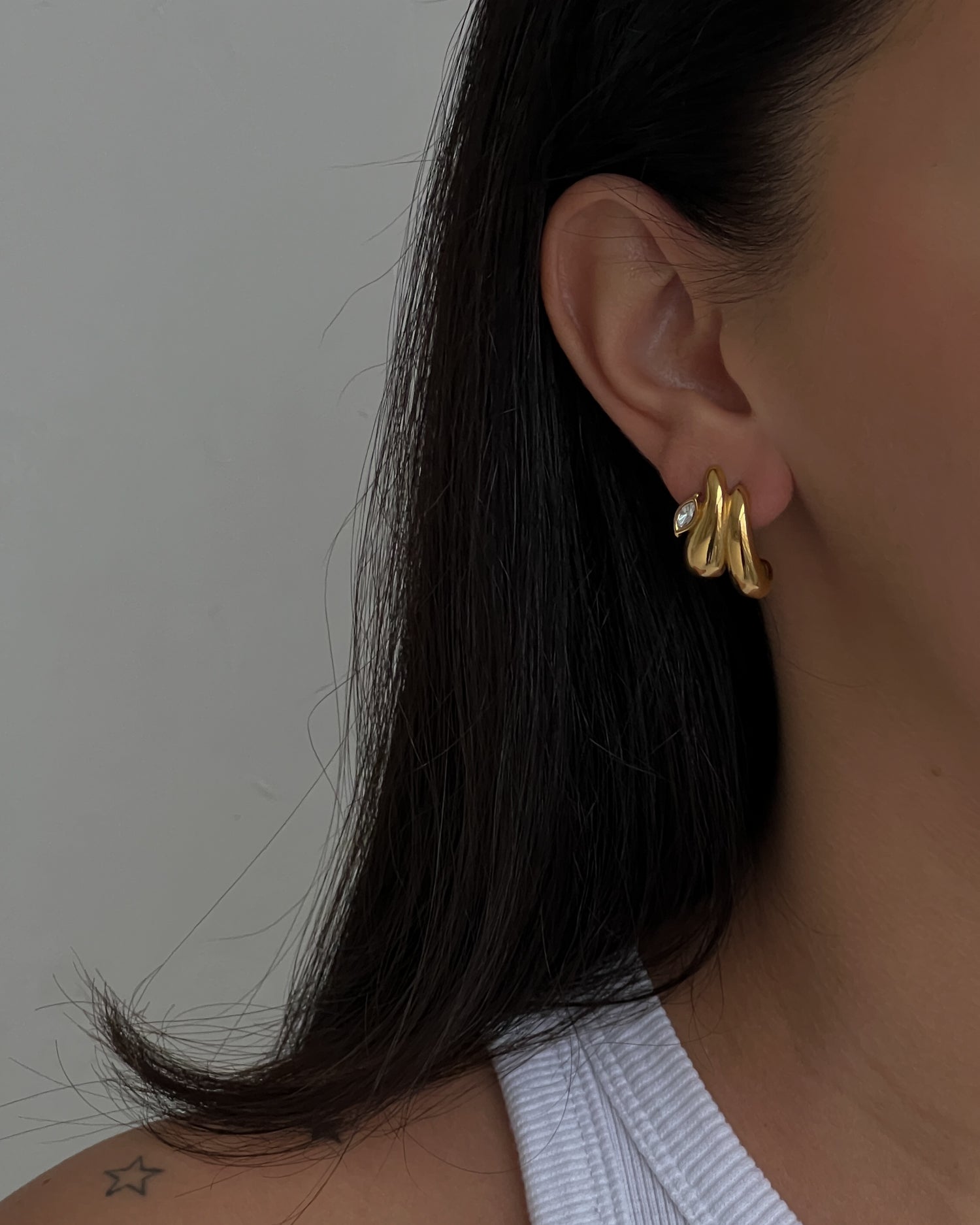 Gold colour studs with zircon