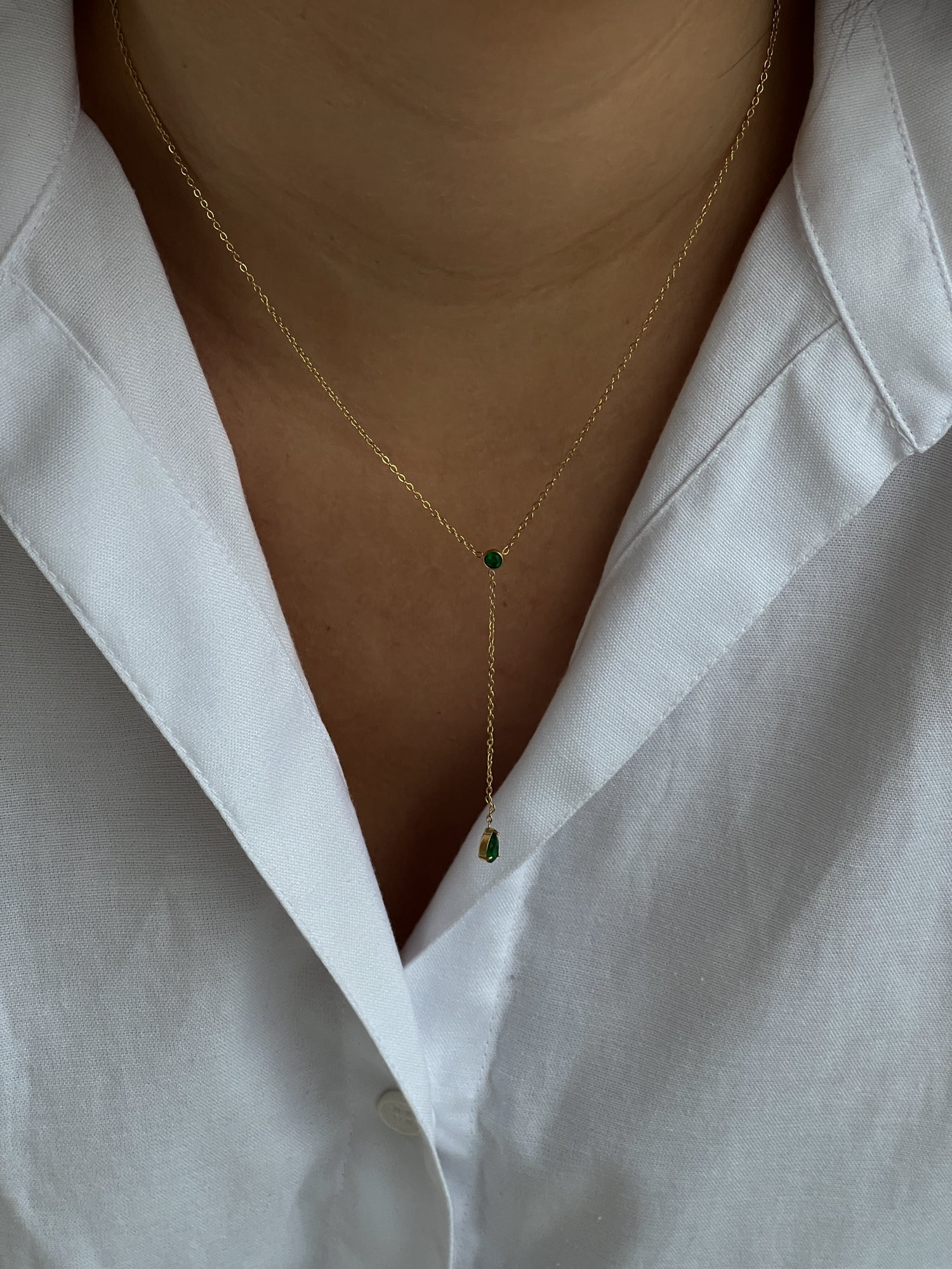 Minimalistic chain necklace with green zircons