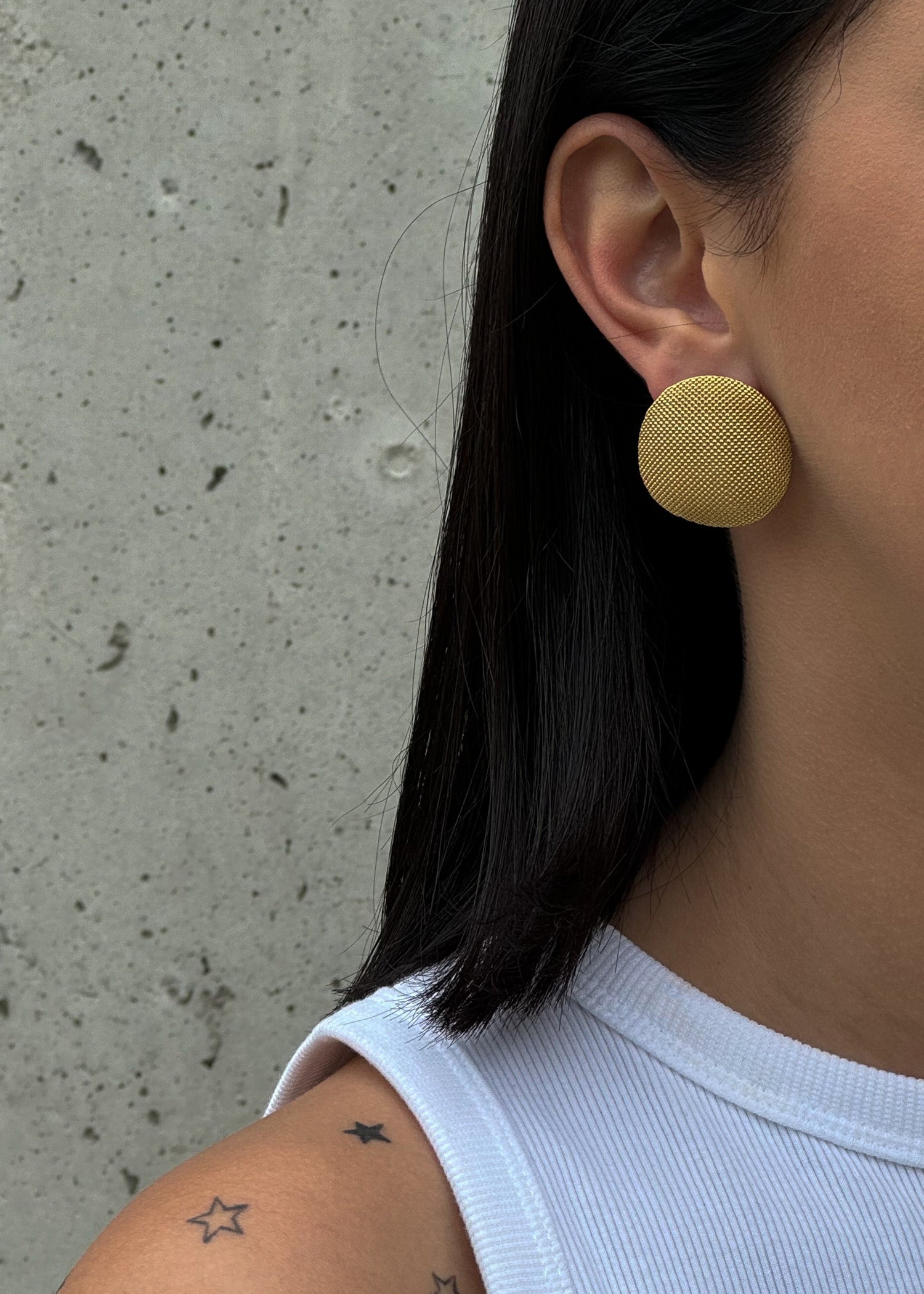 Big gold colour modern stud earrings