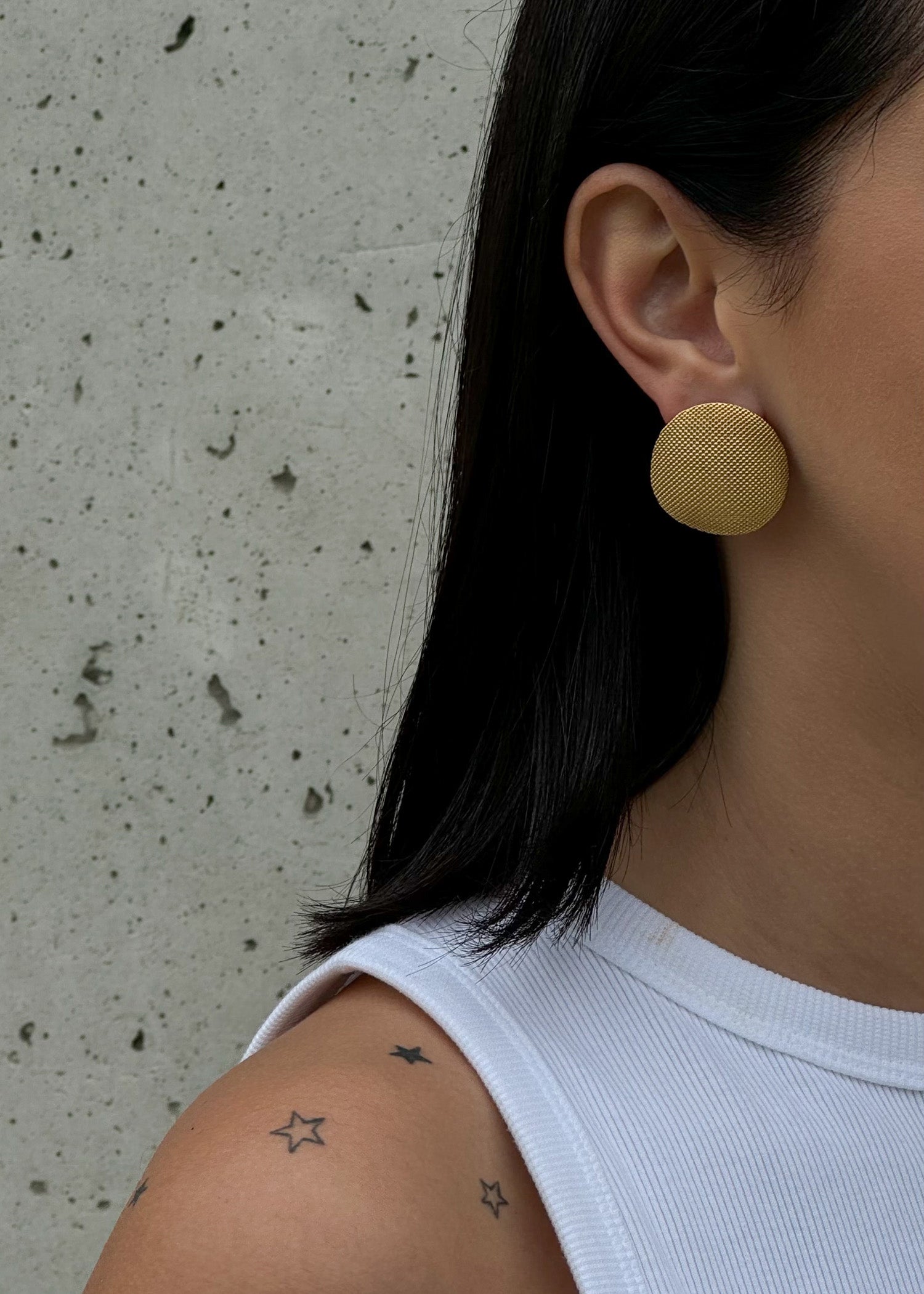 Big gold colour modern stud earrings