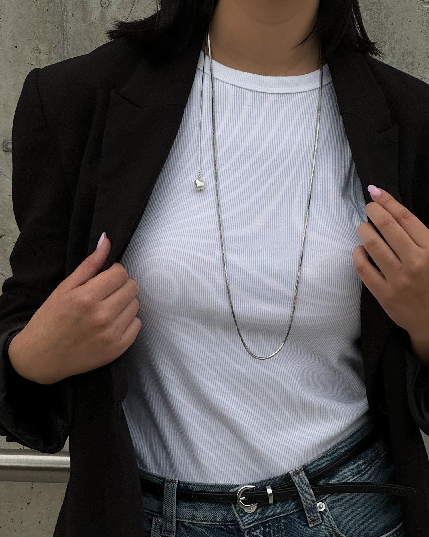 Modern silver colour necklace with a pearl