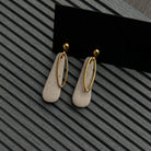 Kabantys auskarai | Dangle drops_sand - MUNÉ