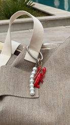 Rankinės pakabukas „Coastal Chic“ - MUNÉ
